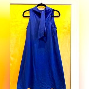 Sleeveless high neck dress with tie at neck by Susana Monaco